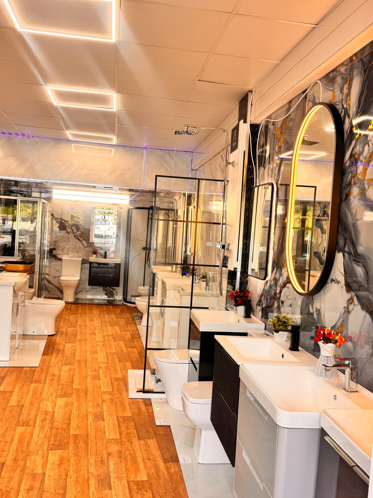 Showroom aisle with shower enclosures, vanities and feature wall panels